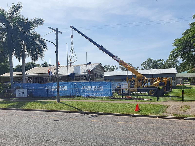 crane installing sheeting bluewater school townsville builder